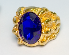 ANILLO DE ACERO INOXIDABLE DORADO CON DIAMANTE AZUL